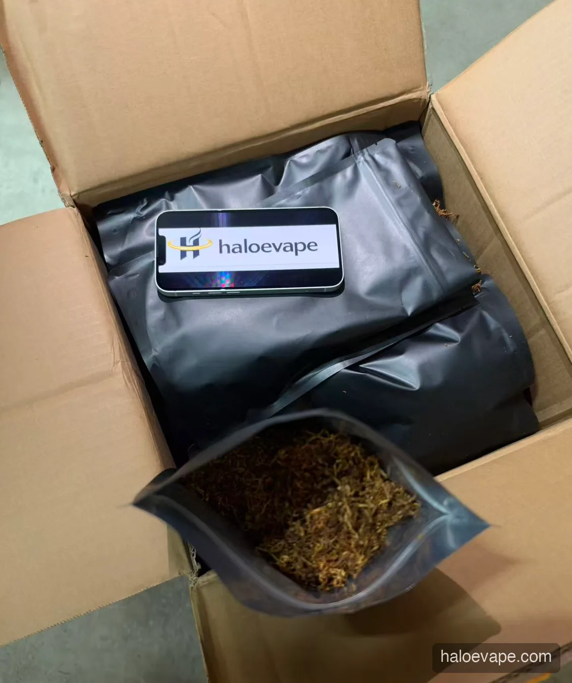 Halo E-Vape order being packed in a plain discreet satchel for Australia Post dispatch